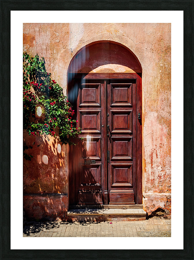 Wooden door in historical town of Colonia del Sacramento  Framed Print Print