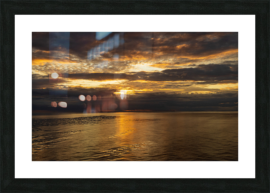 Golden sunset on a cruise on a calm Pacific ocean  Framed Print Print