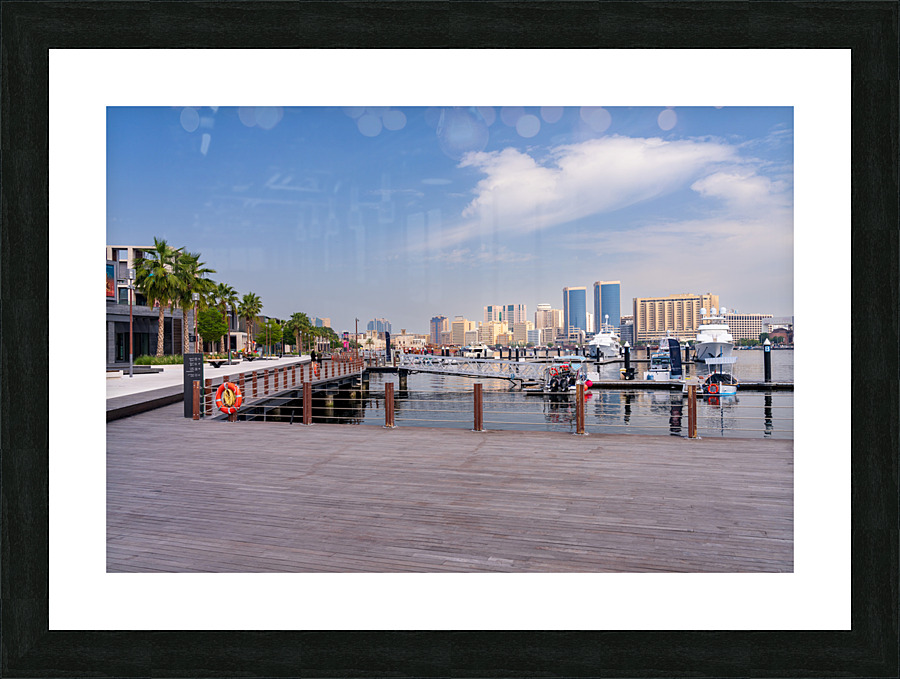 The Creek by Bur Dubai and Al Seef with large docked boats  Framed Print Print
