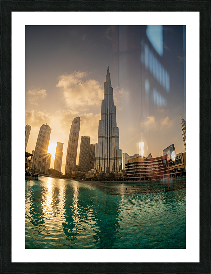 Sunset over the Dubai downtown business district  Framed Print Print