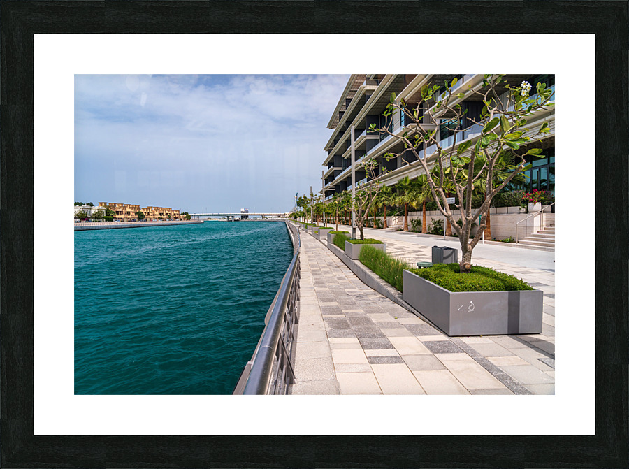 Modern apartments on the Dubai Canal close to Jumeirah beach  Framed Print Print