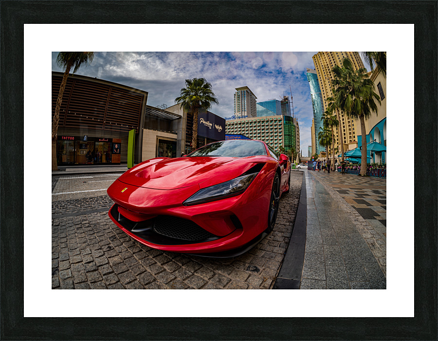Red Ferrari parked in JBR Beach area of Dubai for rental  Framed Print Print