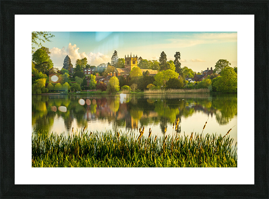 View across the Mere to the town of Ellesmere in Shropshire  Framed Print Print