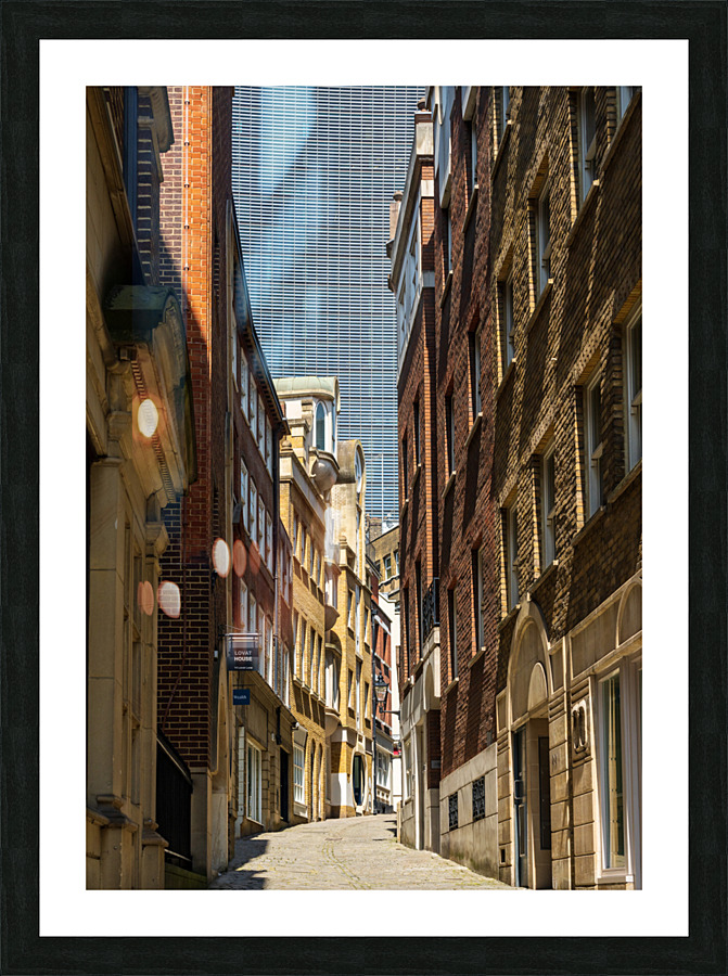 Lovat Lane in the City of London with skyscrapers filling sky  Framed Print Print