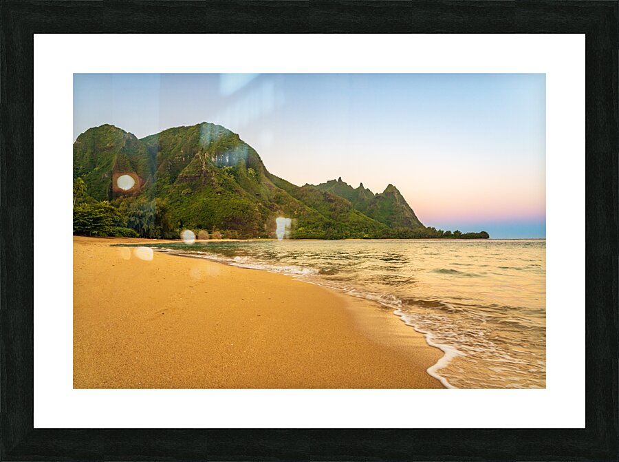 Early morning sunrise over Tunnels Beach on Kauai in Hawaii  Framed Print Print