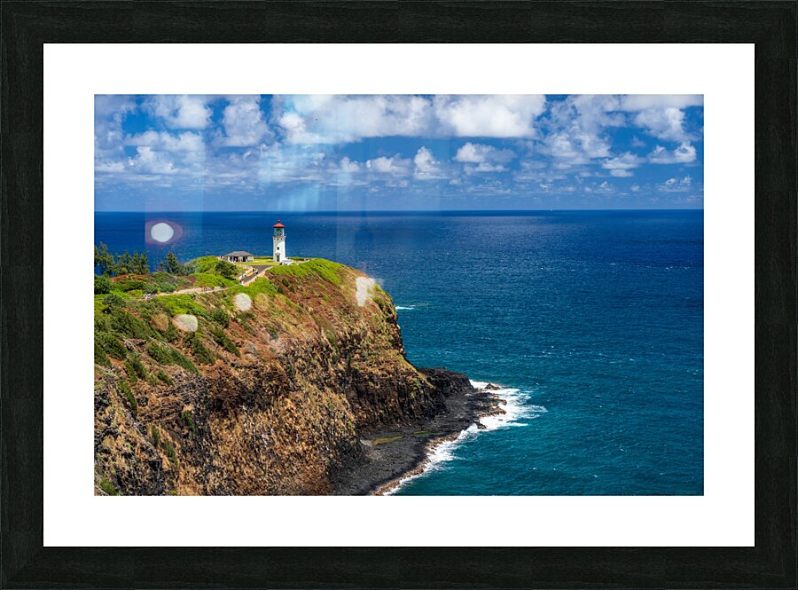 Kilauea lighthouse on headland against blue sky on Kauai Picture Frame print