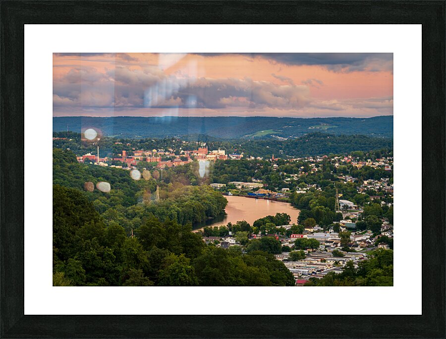 Sunset lights the sky above Morgantown in West Virginia  Framed Print Print