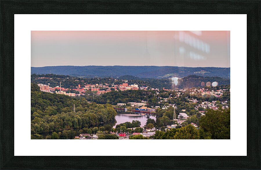 Sunset lights the sky above Morgantown in West Virginia  Framed Print Print