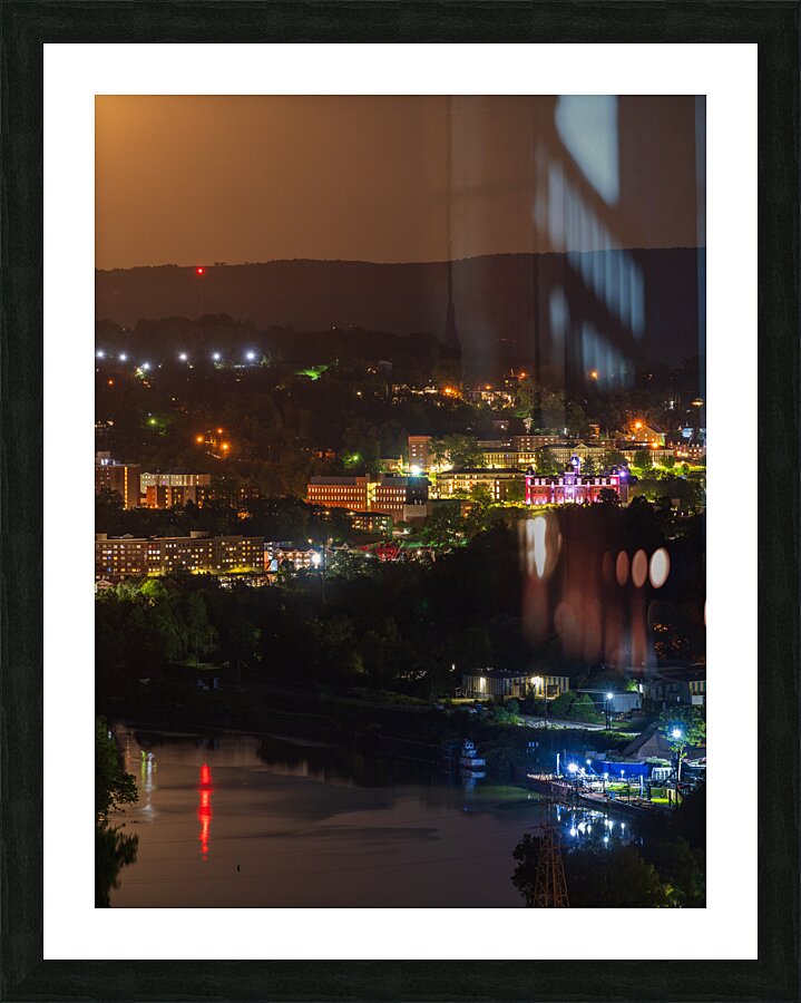 Supermoon rises in the sky above Morgantown in West Virginia  Framed Print Print