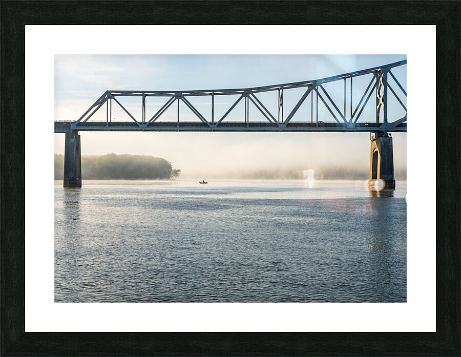 Fisherman fishing in Mississippi river on misty autumn morning  Framed Print Print