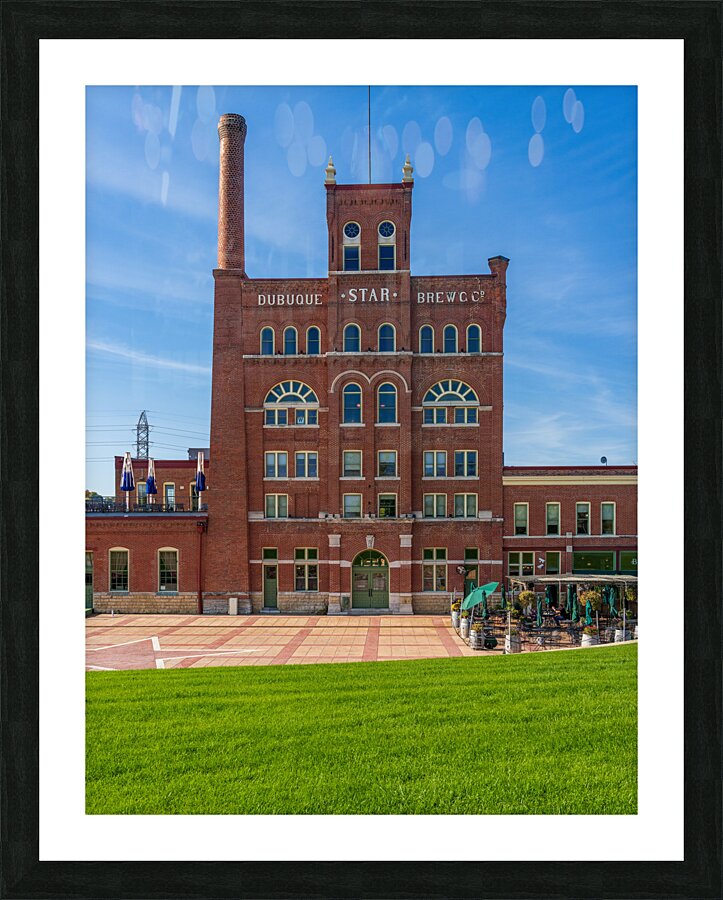 Historic Dubuque Star Brewery alongside Mississippi river  Framed Print Print