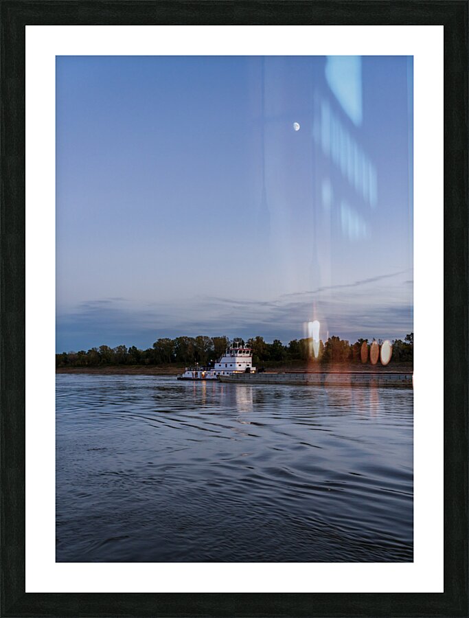 Freight barges on Mississippi river at dusk with moon  Framed Print Print