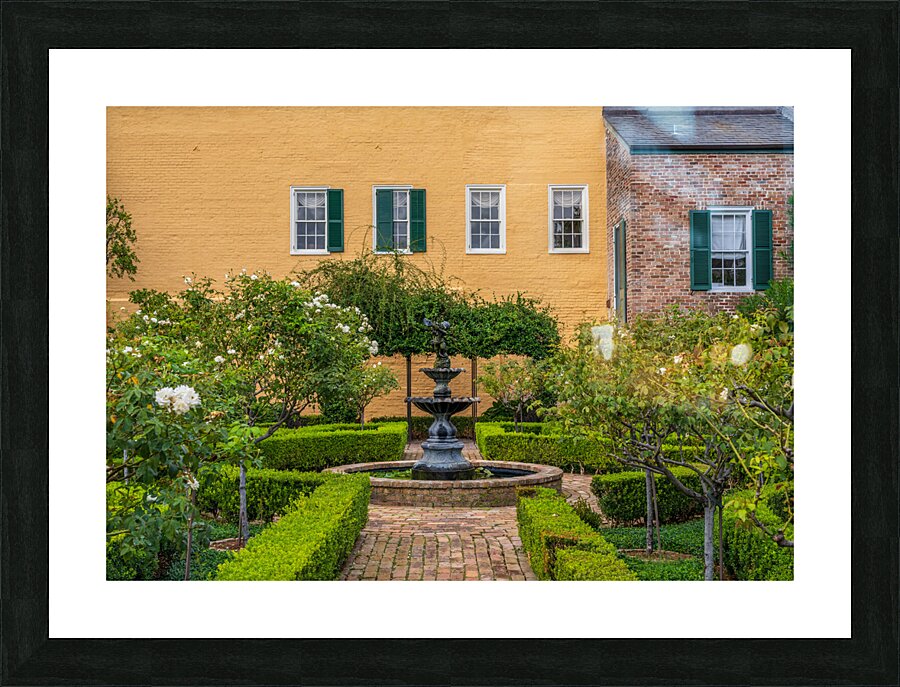 Small tree filled garden in French Quarter of New Orleans  Framed Print Print
