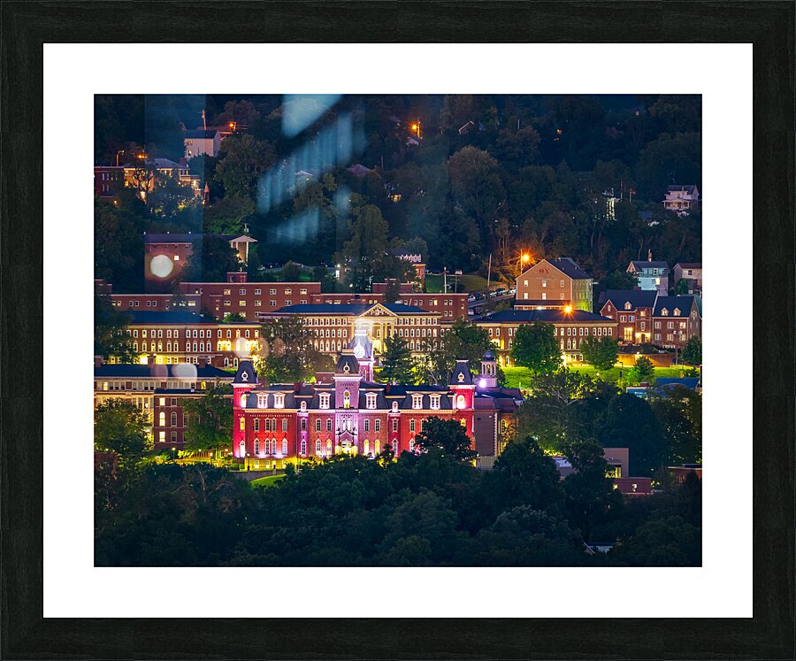 Downtown campus of West Virginia university at nightfall  Framed Print Print