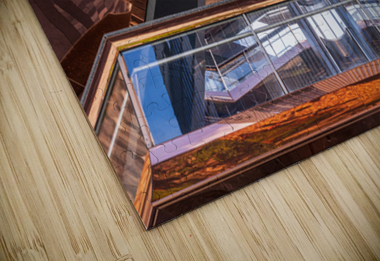 Reflective surface of the Vessel with photographer below Steve Heap Puzzle