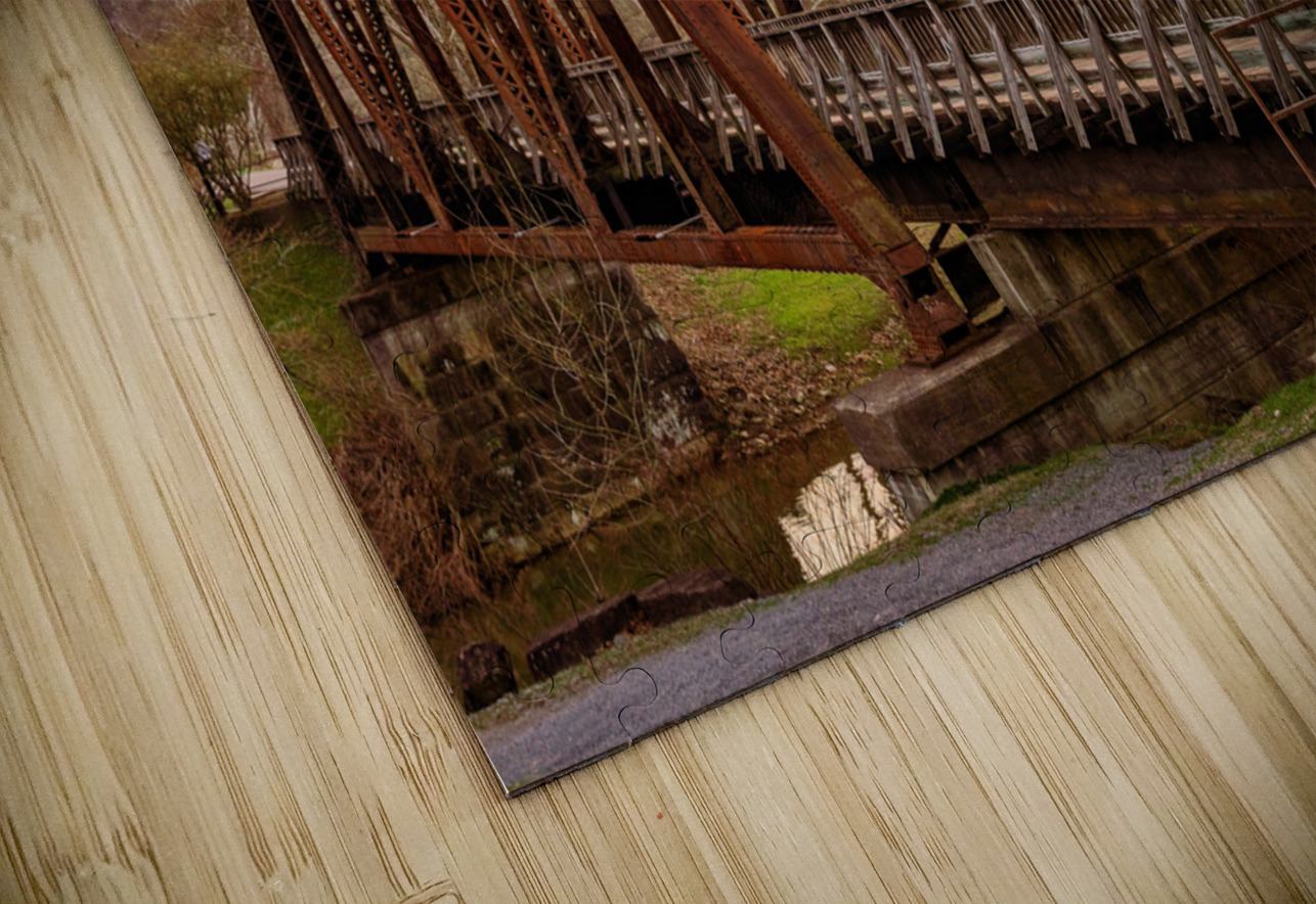 Steel girder bridge carries the bike walking trail over Deckers  Steve Heap Puzzle