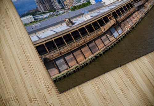 Tall office and apartment buidlings along the waterfront in Manh Steve Heap puzzle