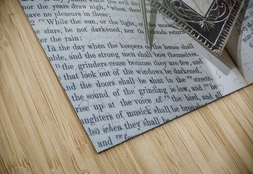 Silver square and compass on Bible for Freemasons Steve Heap puzzle