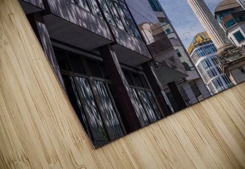 Modern office buildings surround the Monument in London Steve Heap puzzle