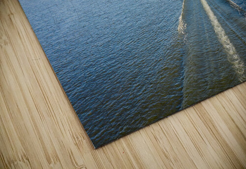 Speedboat on Cheat Lake on a summer evening with boats docked in Steve Heap puzzle