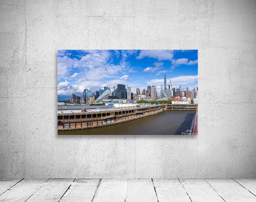 Tall office and apartment buidlings along the waterfront in Manh Wall Preview