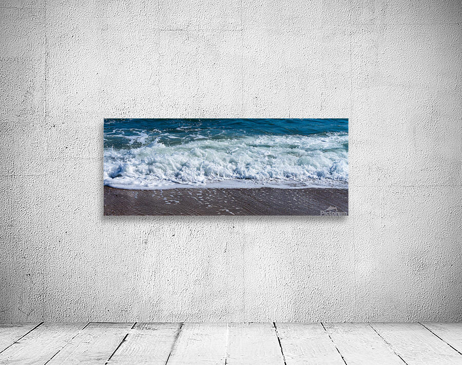 Frozen motion of waves crashing onto a pebble beach on the Isle  Wall Preview