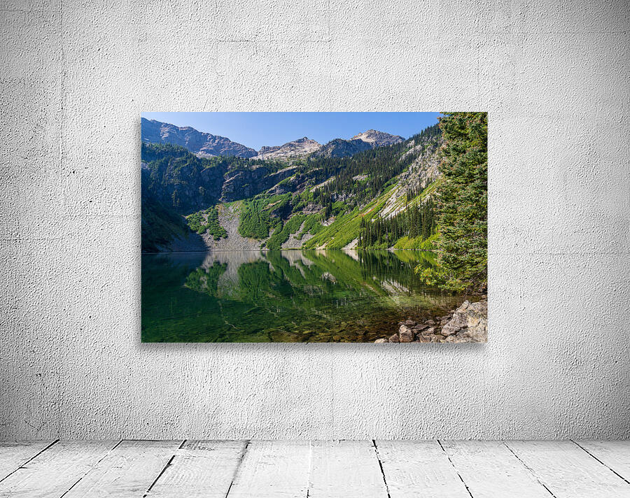 Mirror image reflection of Rainy Lake in North Cascades National Wall Preview