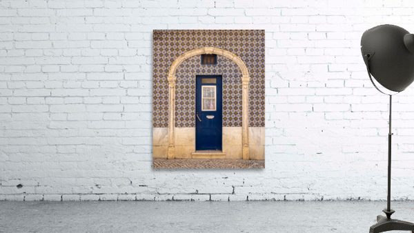 Blue door in ceramic tiled home in Lisbon by Steve Heap