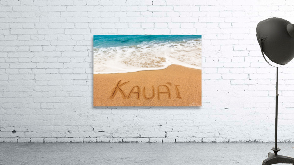 Kauai written in sandy beach by Steve Heap