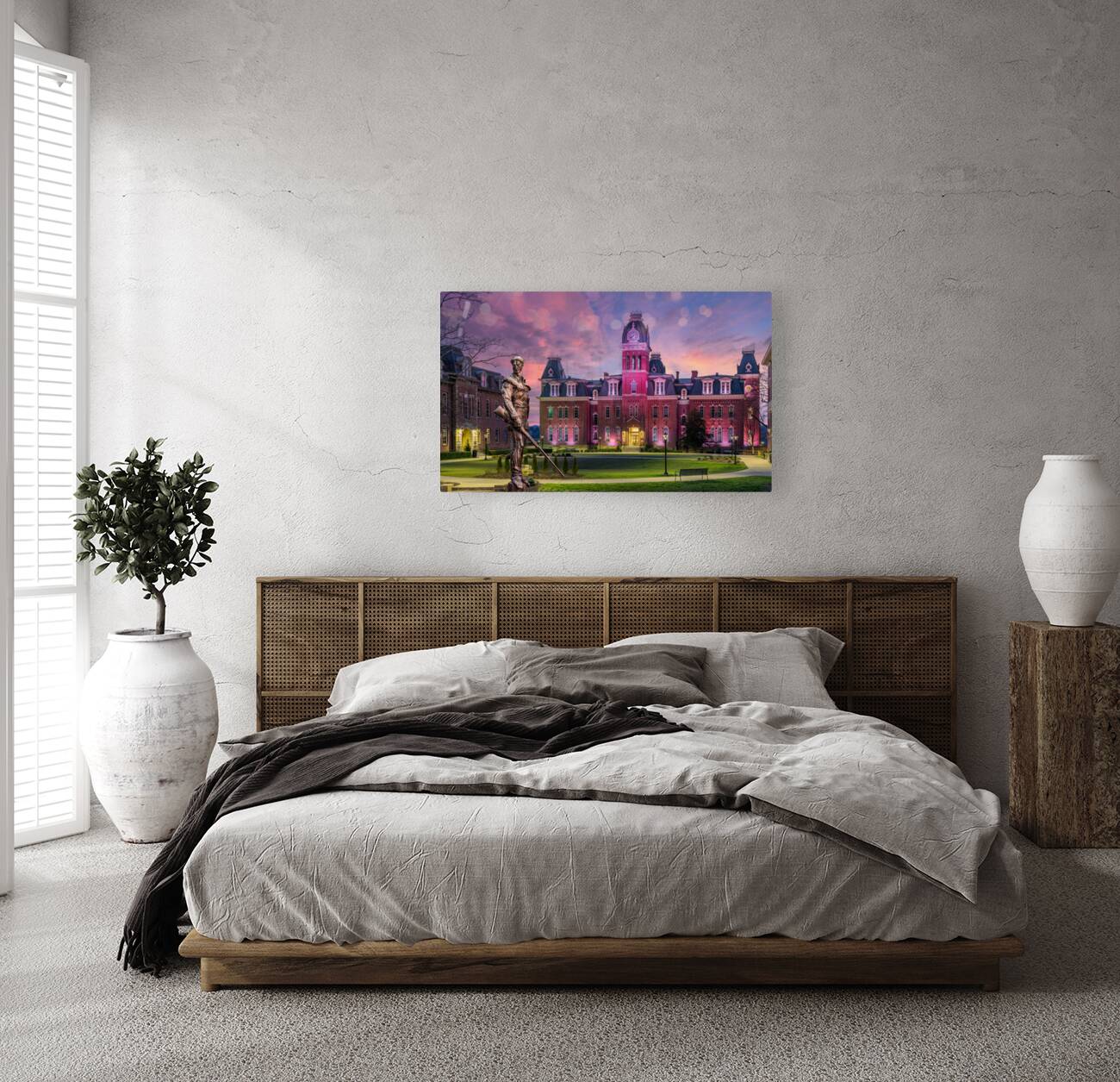 Mountaineer statue in front of Woodburn Hall at WVU Reproduction