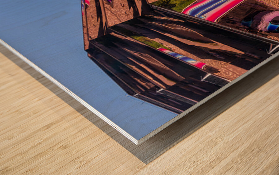 Reflective surface of the Vessel with photographer below Wood print