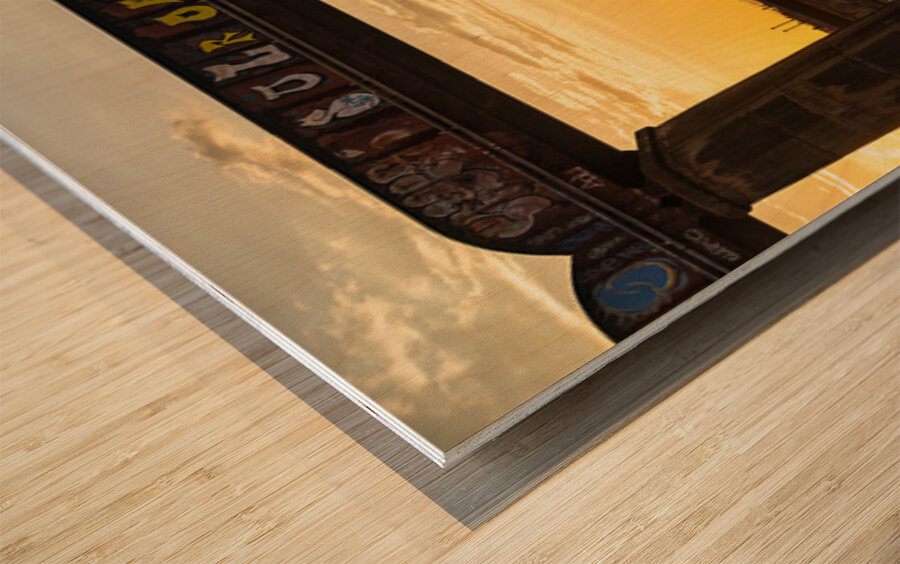 Bridges behind the railroad bridge in Austin at sunset Wood print