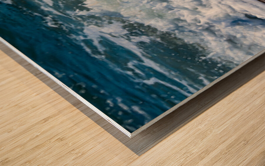 Frozen motion of waves crashing onto a pebble beach on the Isle  Wood print