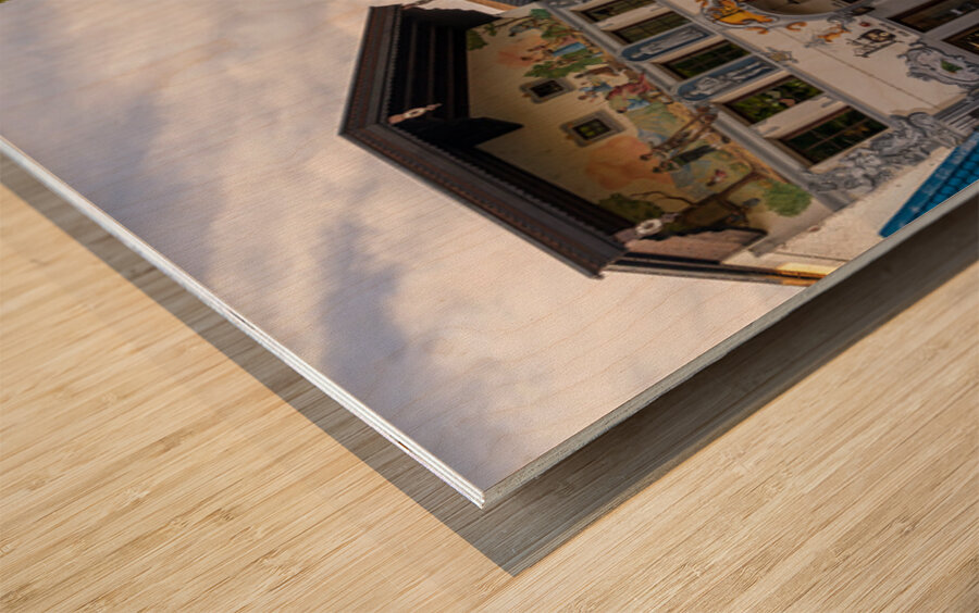 Alpine scenes on hat and candle store in Leavenworth WA Wood print