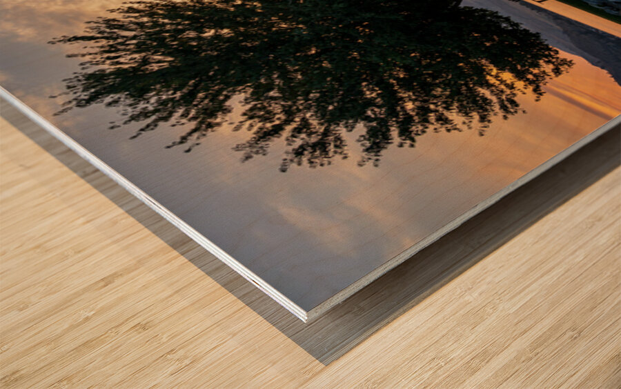 Sunset over Lake Chelan with silhouette of tree and chairs for r Wood print