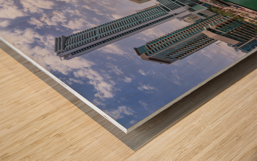 Modern buildings crowd the waterfront at Dubai Marina UAE Wood print