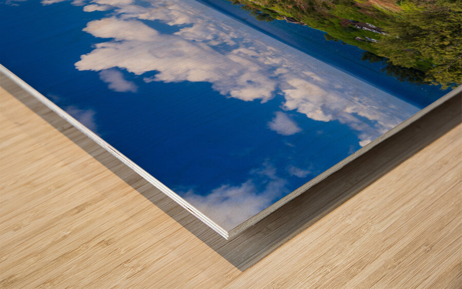 Kilauea lighthouse on headland against blue sky on Kauai Wood print