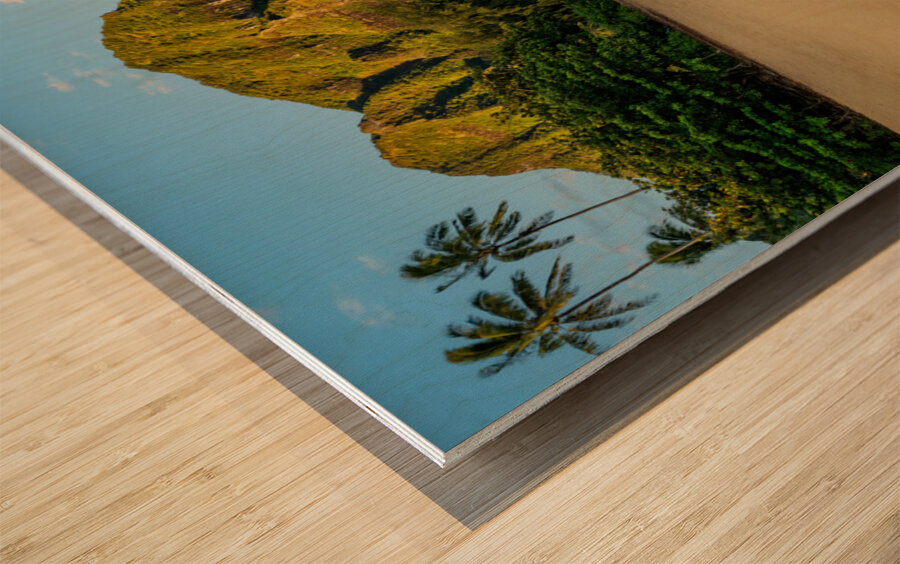 Early morning sunrise over Tunnels Beach on Kauai in Hawaii Wood print