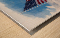 Digital art of USA stars and stripes flag against blue sky Wood print
