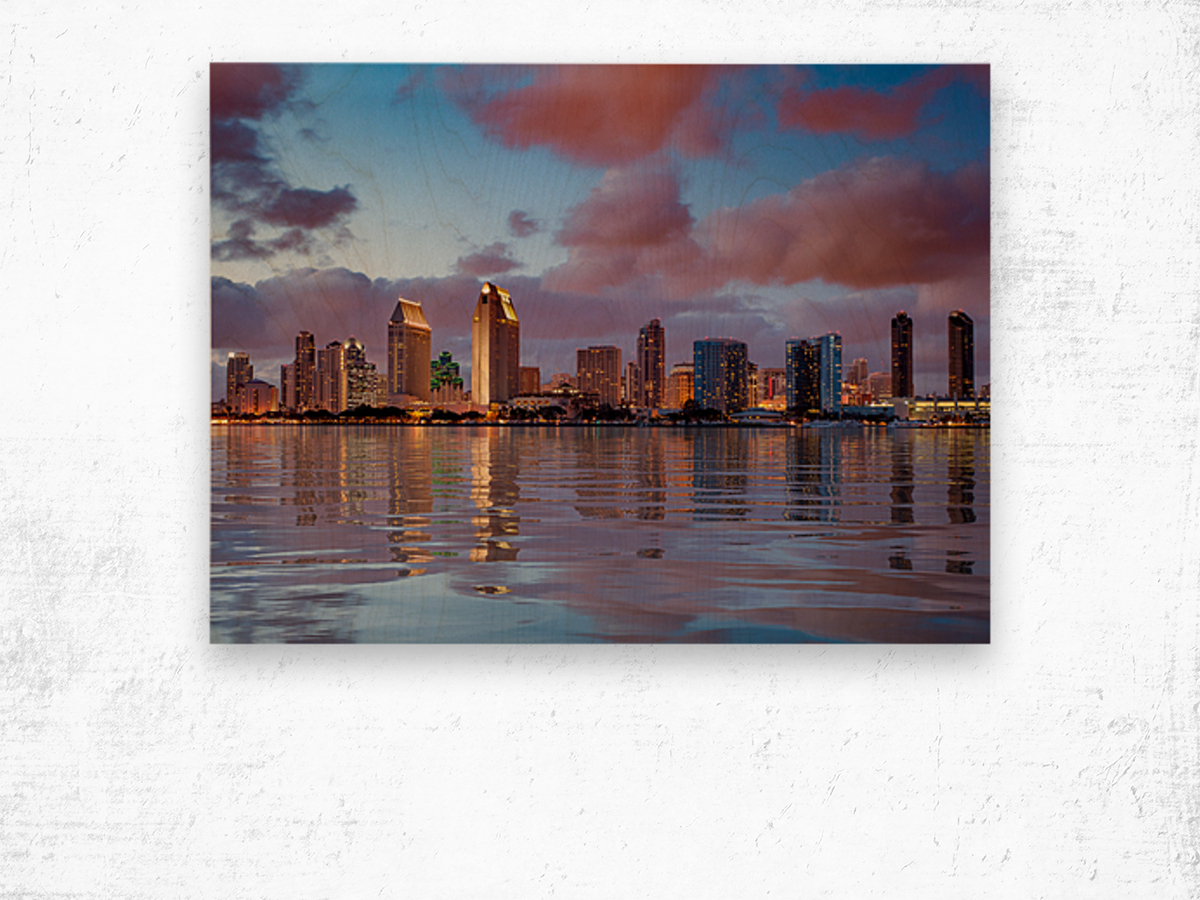 San Diego skyline at dusk reflected in sea Wood print
