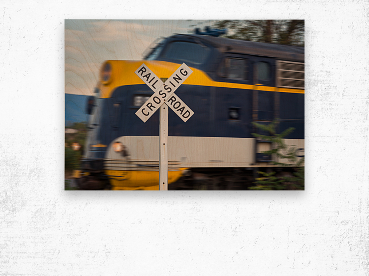 Diesel engine with railroad crossing sign Wood print