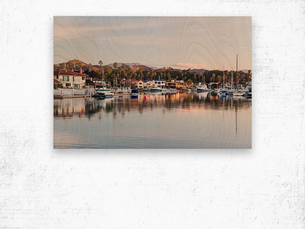 Sunrise over homes and boats ventura Wood print